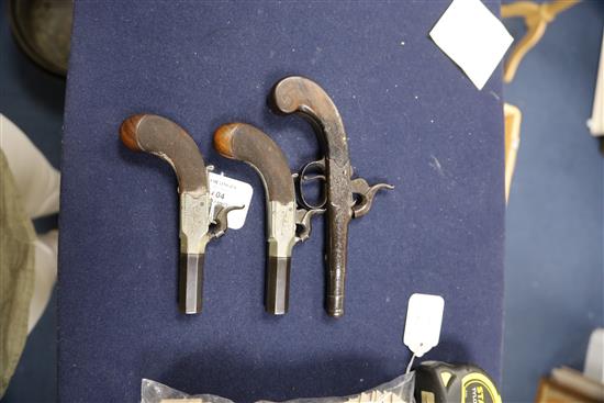 A pair of early 19th century Lacey & Co of London box lock muff pistols, 7.5in.